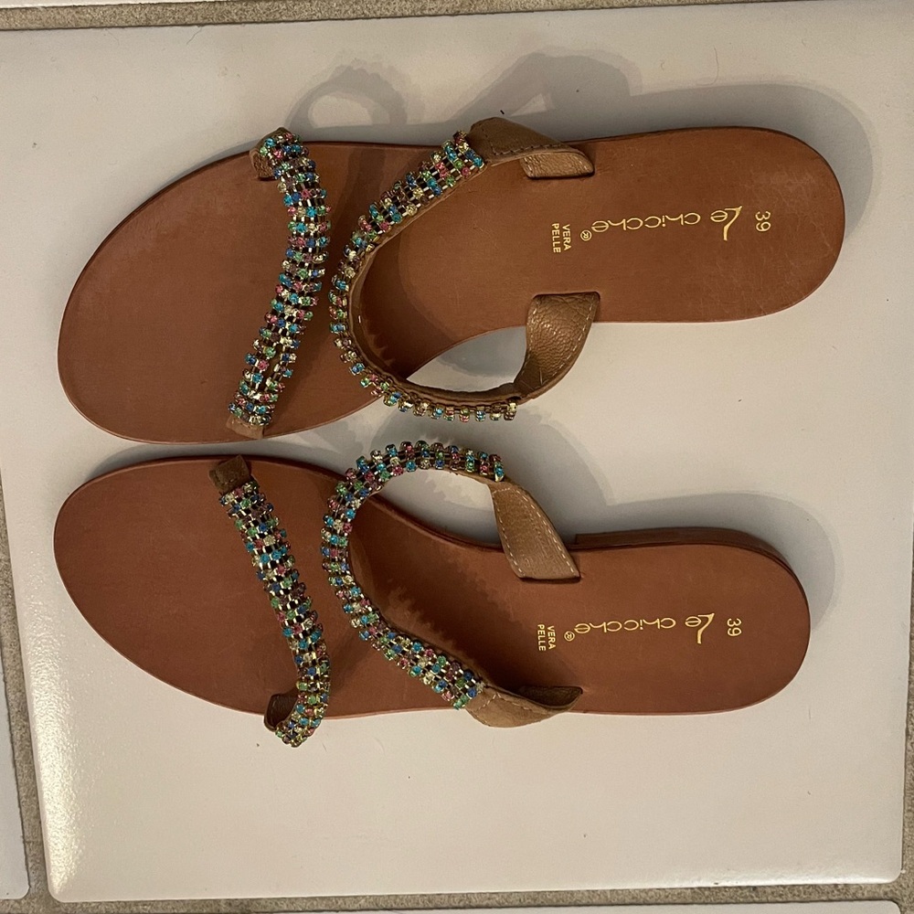 Flat leather sandals.